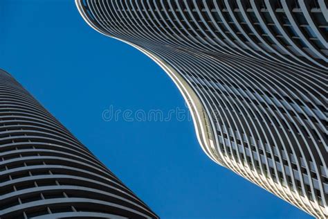 Curvy Skyscrapers Against Blue Sky Stock Image Image Of Street Curve