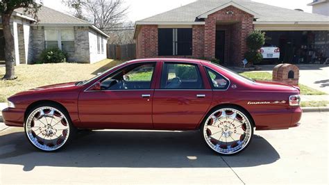 Chevy Impala Sitting On 30 Inch Forgiato Big Rims Custom Wheels
