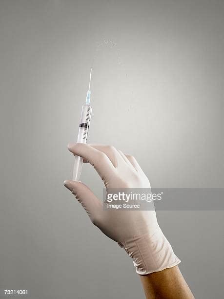 syringe squirt photos and premium high res pictures getty images