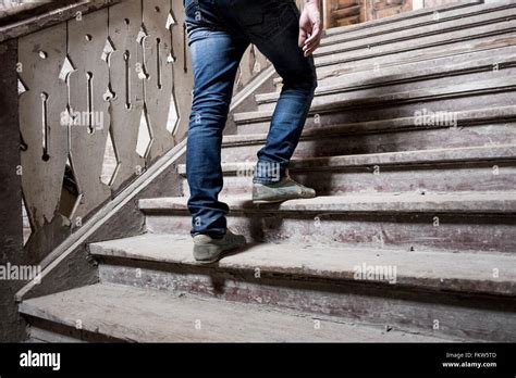 Man Going Up Staircase Stock Photo Alamy