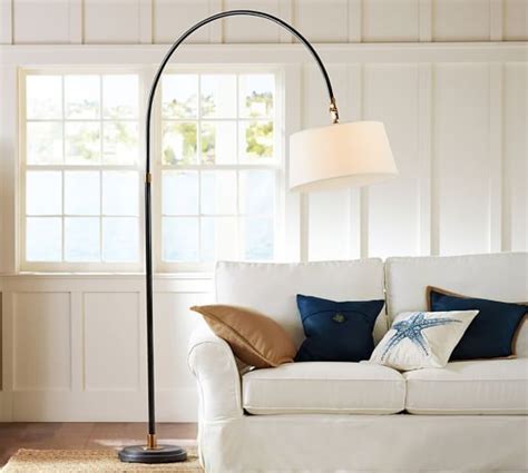 Fun and crisp, the escada tripod floor lamp fun and crisp, the escada tripod floor lamp is sure to brighten your living space with modern flair. Winslow Arc Sectional Floor Lamp | Pottery Barn Great for family room, in corner behind the ...