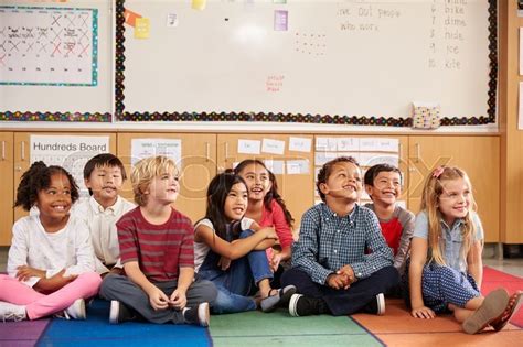 Elementary School Kids Sitting On Stock Image Colourbox