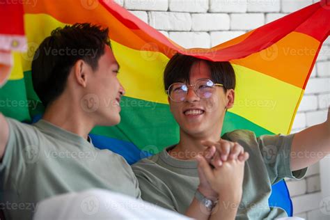 Happy Asian Gay Couple Holding Hands Together Relaxing At Home On Bed Lgbtq Concept 10279706