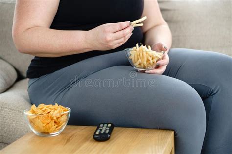 Overweight Man With Tv Remote And Junk Food Stock Image Image Of