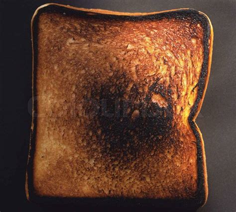 A Piece Of Very Burnt Toast Stock Photo Colourbox