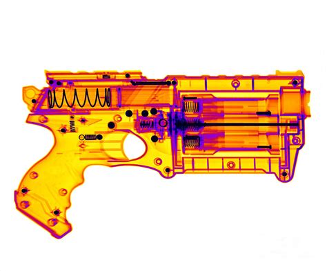 An X Ray Of A Toy Gun Photograph By Ted Kinsman Fine Art America