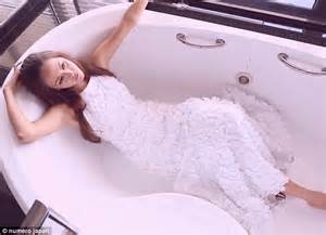 Jessica Michibata Poses In White Gowns Before Jumping In The Bath For