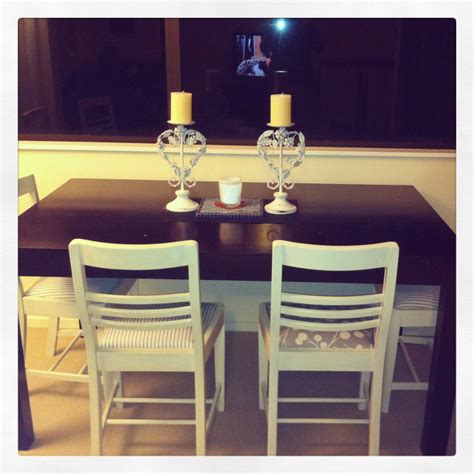 The substantial tenon is inset into the drums. Dark brown table with refurbished white dining chairs ...