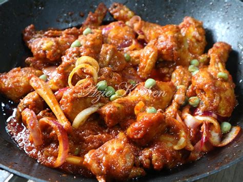 The red sauce mentioned here comes from tomatoes and is mildly spiced with aromatics such as ginger, garlic and dried chillies. Nasi Minyak dan Ayam Masak Merah Sangat Sedap (A Keeper ...