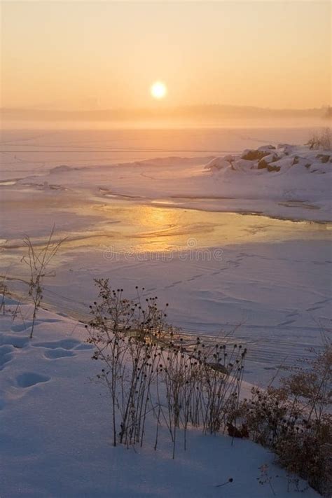 Misty Winter Sunrise Over A Frozen Lake Stock Image Image Of Nature