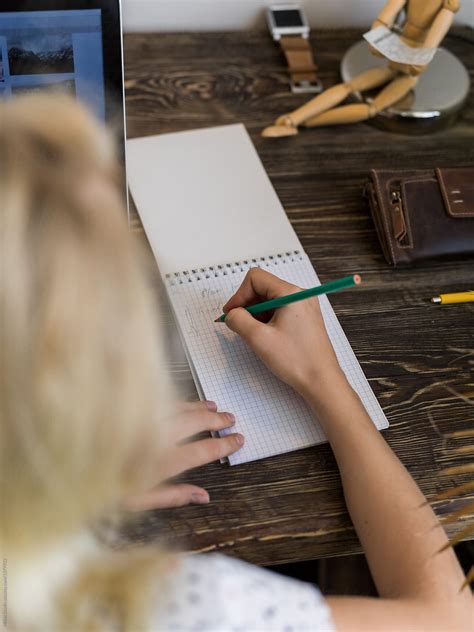 Woman Writing In Notepad By Stocksy Contributor Milles Studio Stocksy