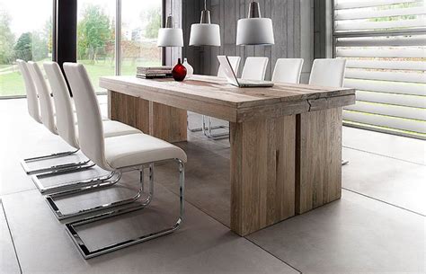 Our dining table comfortably seats 8 people but in a pinch can seat 10. 10 seater oak table and chairs