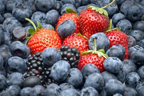 Closeup Of Strawberries Blackberries And Blueberries Stock Image