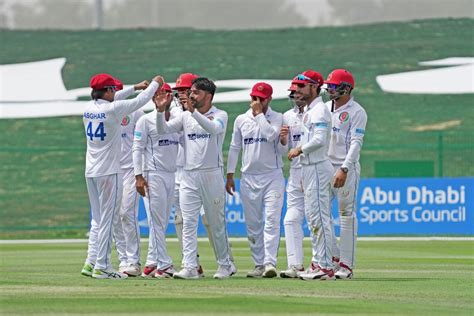 Rashid Khan Bumps Fists With Captain Asghar Afghan