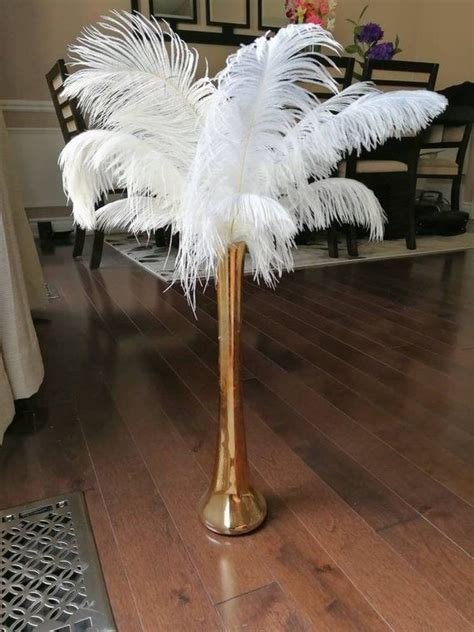 An 18 24k gold dipped rose set in our eiffel tower glass bud vase that is reminiscent of the worldwide known lankmark in paris, france. PROMO Gold 16" Tall Ostrich Feather Centerpiece Kits with ...
