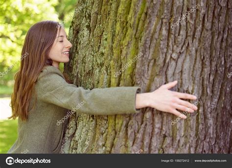Smiling Brunette Woman Hugging Tree Trunk Stock Photo Racorn