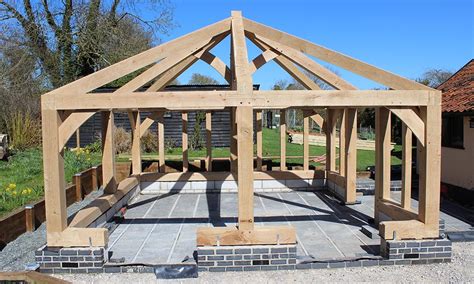 Next, we cut both sets of jacks for the first hip and installed them with pocket screws. Square pyramydial roof | Chaplin Oak timber framing