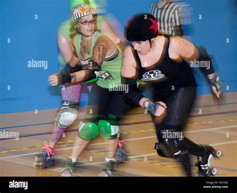 Roller Derby Skaters In Action Stock Photo Alamy