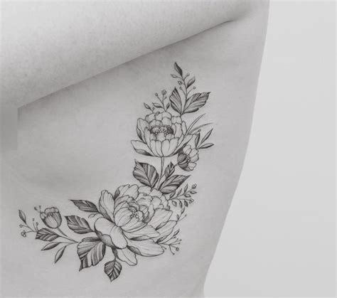 25 Best Ideas About Flower Rib Tattoos On Pinterest Delicate