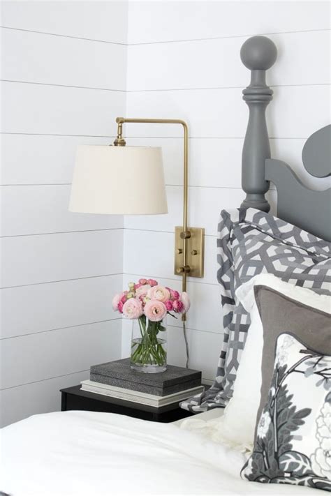 The ic wall light features no frills and a captivating minimalist aesthetic, making it a great addition to any space from hallways to bedrooms. Wall Sconces by the Bed: Get Inspired! | The Inspired Room