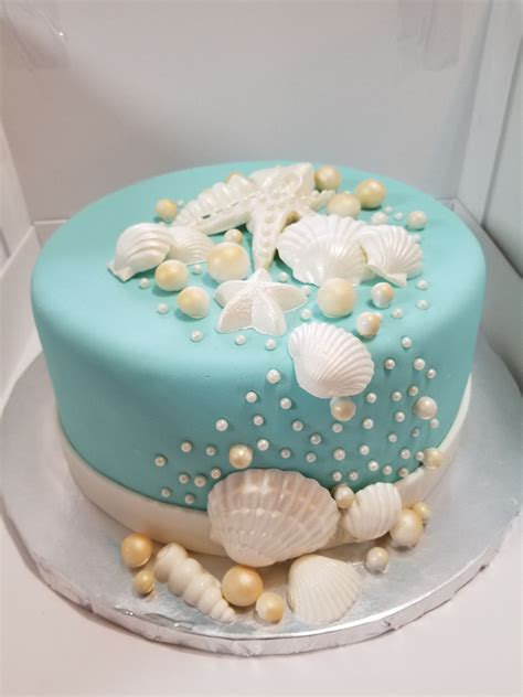 Beach wedding cakes and seashell wedding cakes are perfect for a tropical or beach wedding theme. Seashell Cake - CakeCentral.com