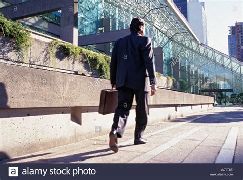Businessman Walking Outdoors Stock Photo Royalty Free Image 3287149