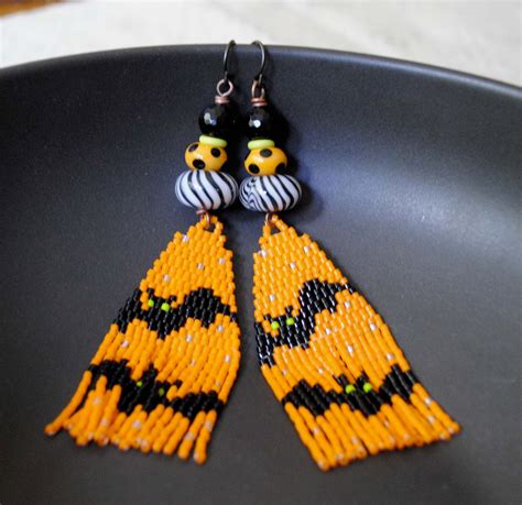 Bright Orange Fringe Earrings Featuring Hand Beaded Components With