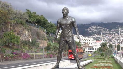 Cristiano ronaldo statue is located by the praça do mar, the pier entrance of the city of funchal (madeira), being a transit point for thousands of tourists. Cristiano Ronaldo Stock Footage Video | Shutterstock