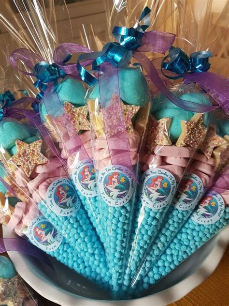 The 3 boxes feature stunning mermaid illustrations on the lid as well as lots of cute under the sea creatures. DIY Mermaid Birthday Party for Kids - Party Wowzy