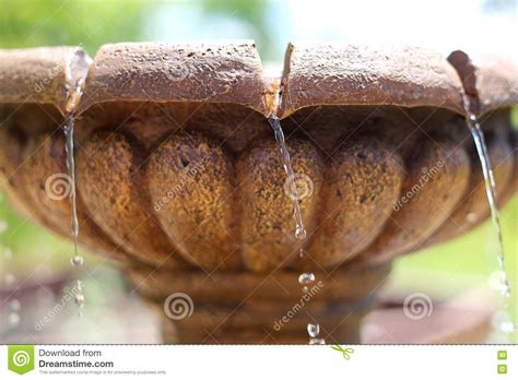 Close Up Of Water Dripping From Garden Fountain Stock Photo Image Of