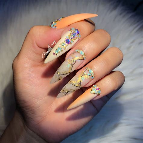 Frosted Marble Stiletto Nail Art By Nailsbytdang Hair Skin Nails