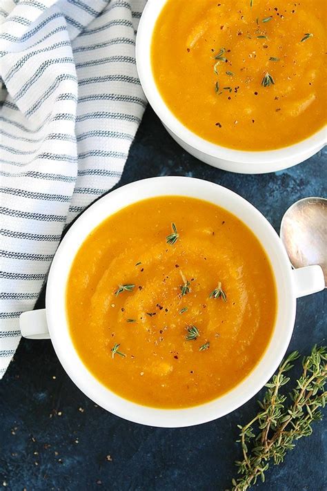 Roasting the butternut squash gives so much more depth of flavor! Easy Butternut Squash Soup {Healthy} - Two Peas & Their Pod