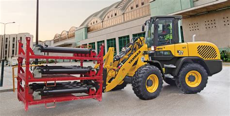 More Than Just A Loader Specialty Buckets Grapples Forks And Snow