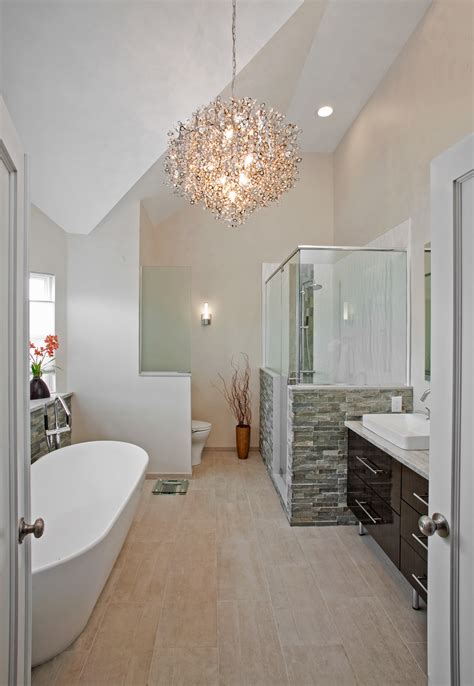 Note how the temperature control handles for the sink are on the side, rather than on the top next to the faucet. Modern Bathrooms Designs and Remodeling | HTRenovations