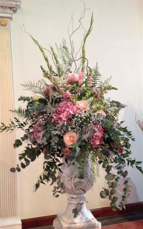 Artificial flowers have come a long way in the past couple of years, but finding excellent quality can still be. Large urn and pedestal arrangement for church | Large ...