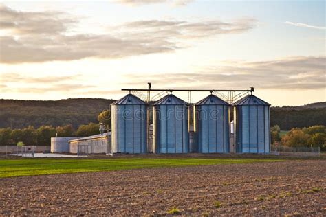 Silos In Sunset With Beautiful View Over Acres Stock Image Image Of