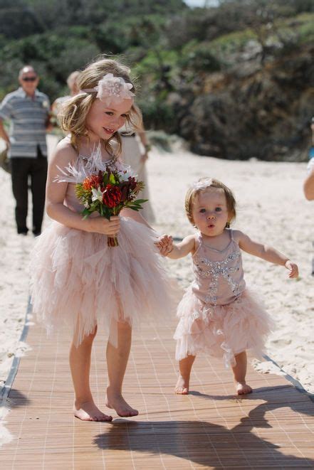 How Cute Are These Two Flower Girls Walking Down The Aisle Photo By