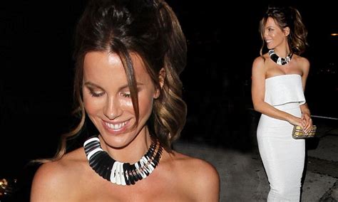 kate beckinsale flaunts pert cleavage in white victoria beckham dress daily mail online