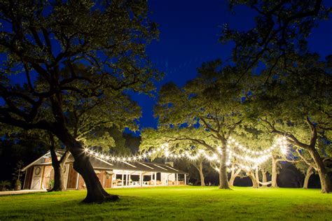 With soaring wood ceilings, a weathered tin roof, and original wood floors made from 300 year old long leaf pines…you know instantly that you've stepped onto a page of hill country history. The Oaks At Boerne | Hill Country Wedding Venue