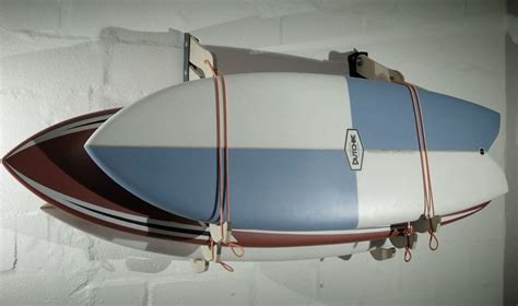 For those who travel around town by bicycle, they know riding with a surfboard under the arm can be cumbersome and awkward. 9 OF THE COOLEST SURFBOARD RACKS EVER