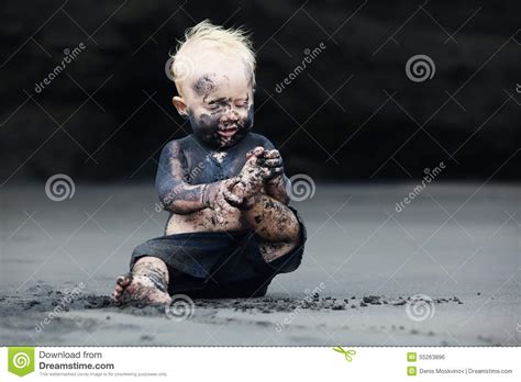 Portrait Of Dirty Child On The Black San Beach Stock Photo Image Of