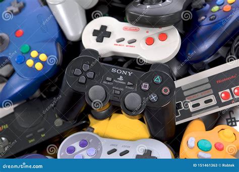 Playstation 2 Controller On A Pile Of Retro Game Controllers Editorial