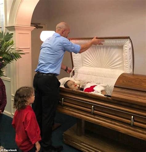 Check spelling or type a new query. Father who shared photos of his wife and child in coffin ...