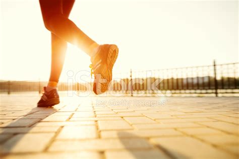 Running Woman Runner Jogging In Sunny Bright Light Female Fitn Stock