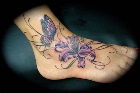 A very tiny small rose tattoo on wrist of girl. 100's of Lily Tattoo Design Ideas Pictures Gallery