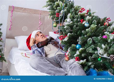 The Man Suffering Hangover After Christmas Party Stock Photo Image Of Office Party