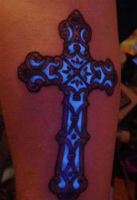 They are striking, often symbolic, and can be incorporated into a variety of designs. Black Light Ink UV Tattoo Cross Design Pictures : Fashion ...