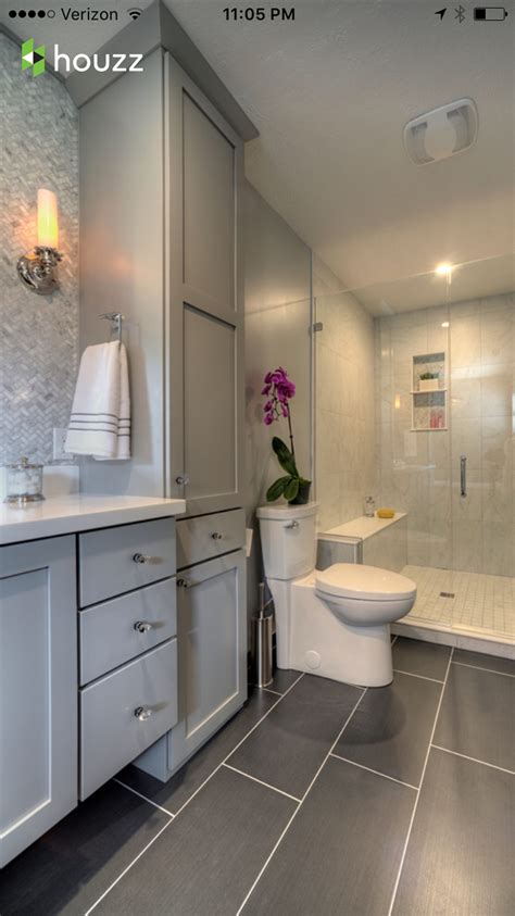 Basement bathroom interior gray white tones. Pin by Julie Webster on Cabinets | Bathroom remodel ...