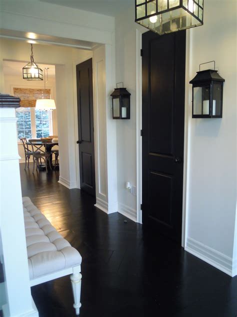 I got these for the front closet, basement door, laundry room, door. White Wood : Black doors add drama