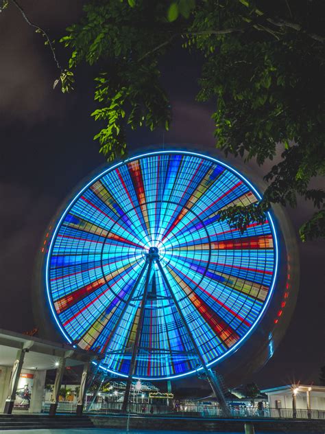 Wallpaper Id 205853 A Bright And Colorful Ferris Wheel Spinning In